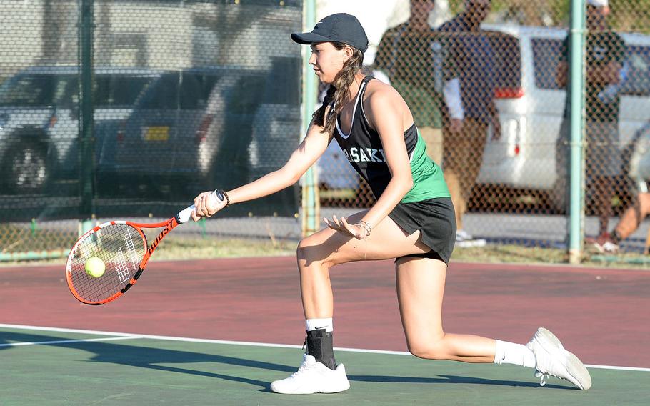 Kubasaki's Lan Legros said she was OK with sweeping the Okinawa district tennis finals titles, but is also hungering for some Far East tournament honors.