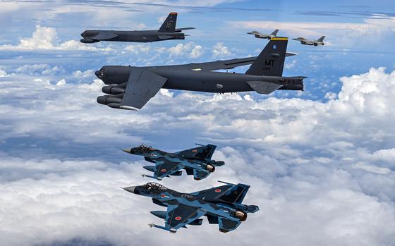 U.S., Japanese and South Korean jets flying in formation.