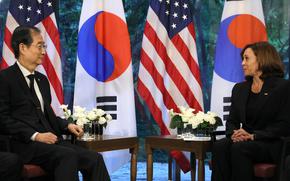 U.S. Vice President Kamala Harris, right, holds a bilateral meeting with South Korea's Prime Minister Han Duck-soo in Tokyo, Tuesday, Sept. 27, 2022. 