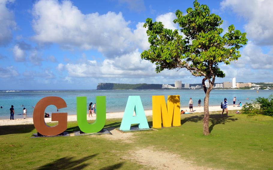 Locals and tourists relax at Ypao Beach in Tamuning, Guam, Dec. 10, 2022.