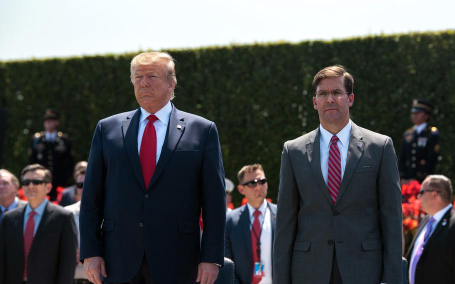 President Donald Trump and Secretary of Defense Mark Esper stand during Esper's welcoming ceremony at the Pentagon in Washington, D.C., July 25, 2019. 