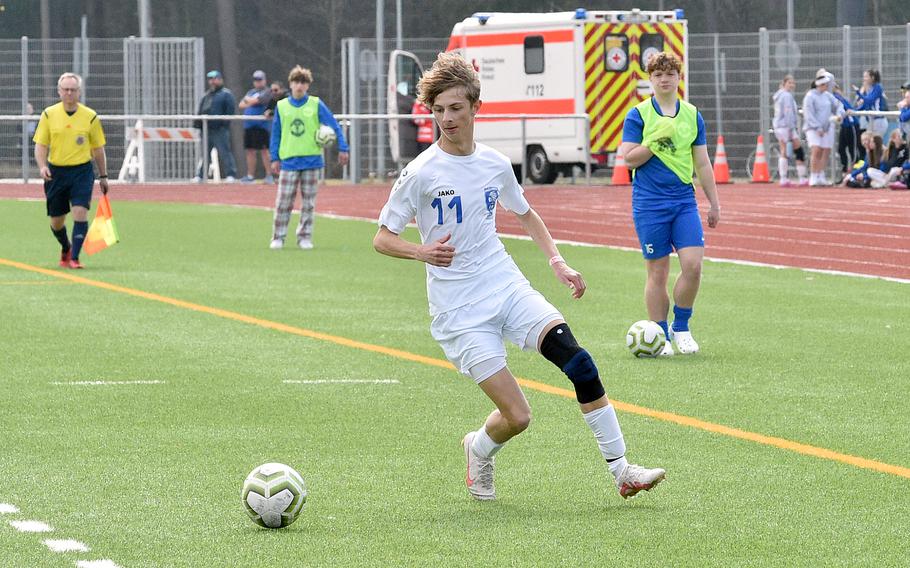 Wiesbaden forward Jacob Goodman catches up to a ball during Saturday afternoon’s matchup with the Royals at Ramstein High School on Ramstein Air Base, Germany. The Warriors defeated the Royals, 2-1.