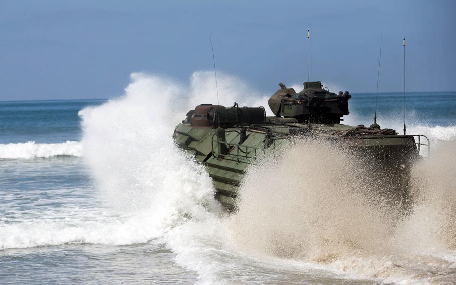 An amphibious assault vehicle heads into the ocean for operations at Marine Corps Base Camp Pendleton, Calif., on April 16, 2021. The Marine Corps has sidelined its aging AAV fleet following the deaths of several Marines in 2020, when one of the vehicles sank off the coast of California during waterborne drills.