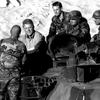 Kuwait, October 28, 1994:  President Bill Clinton chats with soldiers from the 69th Armored Regiment during a visit to Tactical Assembly Area Liberty in the Kuwaiti desert.
 
Looking for Stars and Stripes’ historic coverage? Subscribe to Stars and Stripes’ historic newspaper archive! We have digitized our 1948-1999 European and Pacific editions, as well as several of our WWII editions and made them available online through https://starsandstripes.newspaperarchive.com/

META TAGS: Kuwait; Iraq; U.S. Army; 