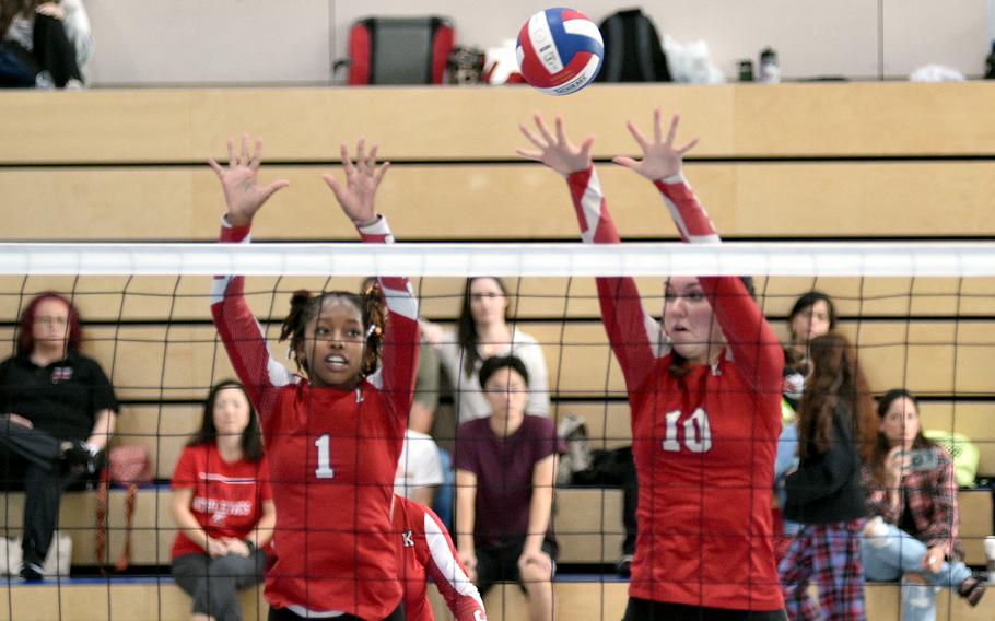 Kaiserslautern teammates Moriah Deane, left, and Mariska Campbell go up for a block during a scrimmage on Sept. 1, 2023, at Ramstein High School on Ramstein Air Base, Germany.