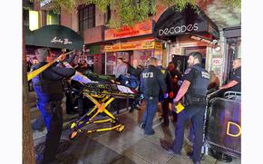 First responders arrive at the scene of a shooting at the Decades nightclub in Washington on Friday. MUST CREDIT: Jabin Botsford/The Washington Post