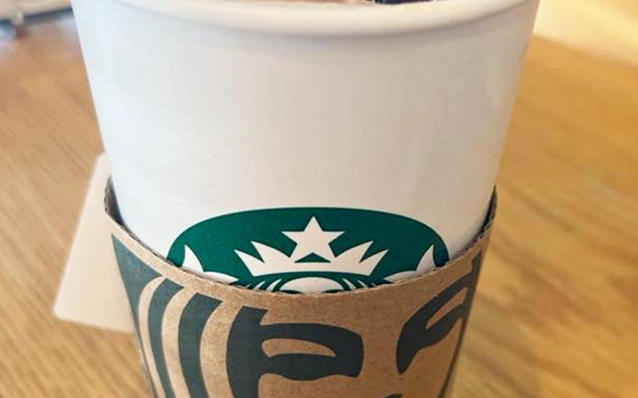 The Double Nama Chocolate Mocha from Starbucks Japan features an espresso steamed milk base topped with nama chocolate whipped cream, chocolate flakes and chocolate sauce. 