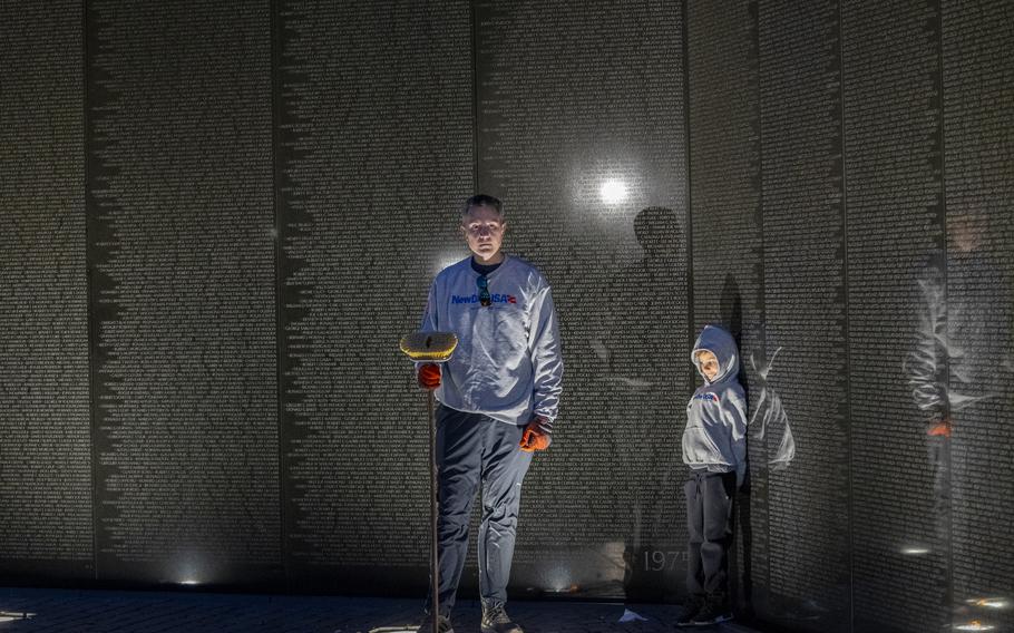 Volunteers wash Vietnam Veterans Memorial ahead of Veterans Day Stars