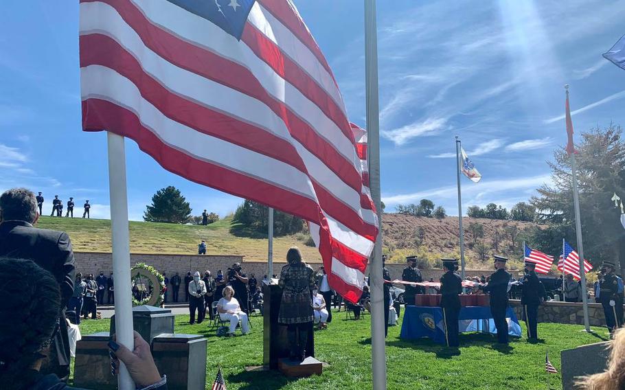 New Mexico Gov. Michelle Lujan Grisham honors the military service of 22 veterans whose remains went unclaimed, giving the eulogy during a funeral at the Santa Fe National Cemetery, Sept. 23, 2021.