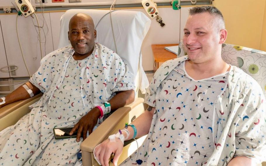 James Harris Jr., left, and Russ Redhead at the University of Maryland Medical Center one day after Harris received one of Redhead's kidneys. 