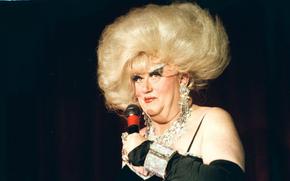 Darcelle appears on stage at Cole's Portland, Ore. nightclub Darcelle XV during a show on Dec. 3, 1998. Walter C. Cole, better known as the iconic drag queen who performed for decades as Darcelle, has died of natural causes in Portland, Ore, on Thursday, March 24, 2023. 