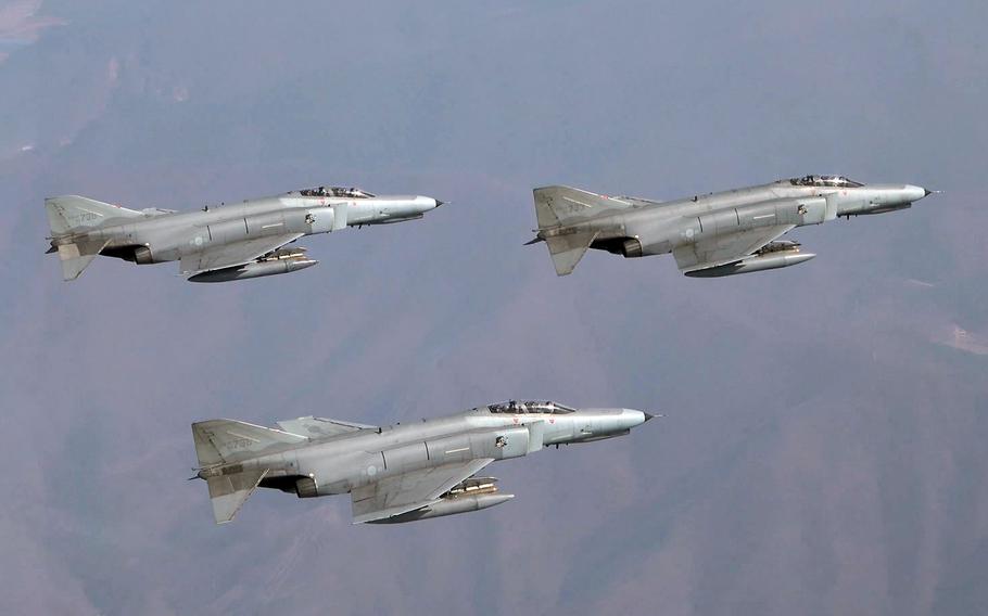 South Korean air force F-4 Phantom IIs prepare to drop 500-pound MK-82 free-fall bombs at an unspecific training site in South Korea, April 4, 2024.