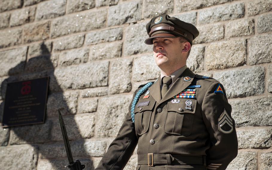 A soldier stands at attention