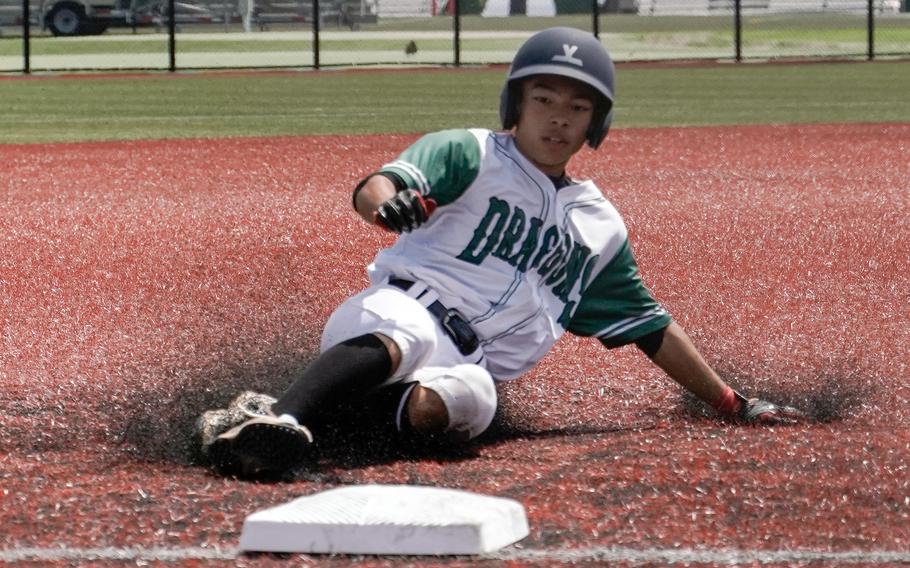 Kubasaki's Rei Koja slides safely into third base.