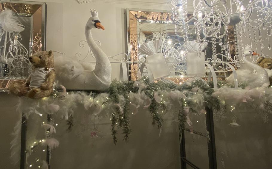 Ornamentation with a swan concept is among the decorative touches in the cafe at the Christmas House in Karlovy Vary, Czech Republic.