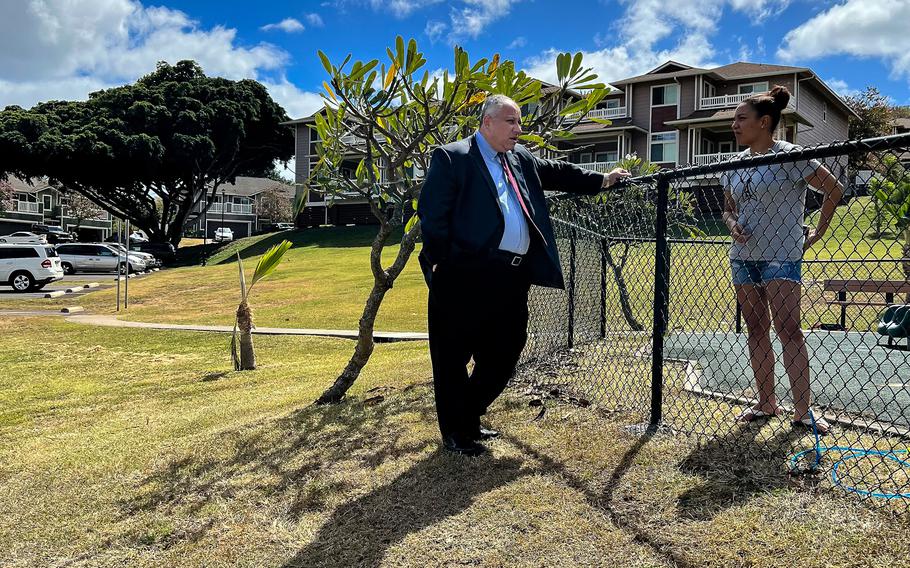 Secretary of the Navy Carlos Del Toro speaks with Air Force Master Sgt. Norma Ozuna at the Red Hill neighborhood near Joint Base Pearl Harbor-Hickam, Hawaii, about restoring and protecting the island’s drinking water, Feb. 26, 2022. 