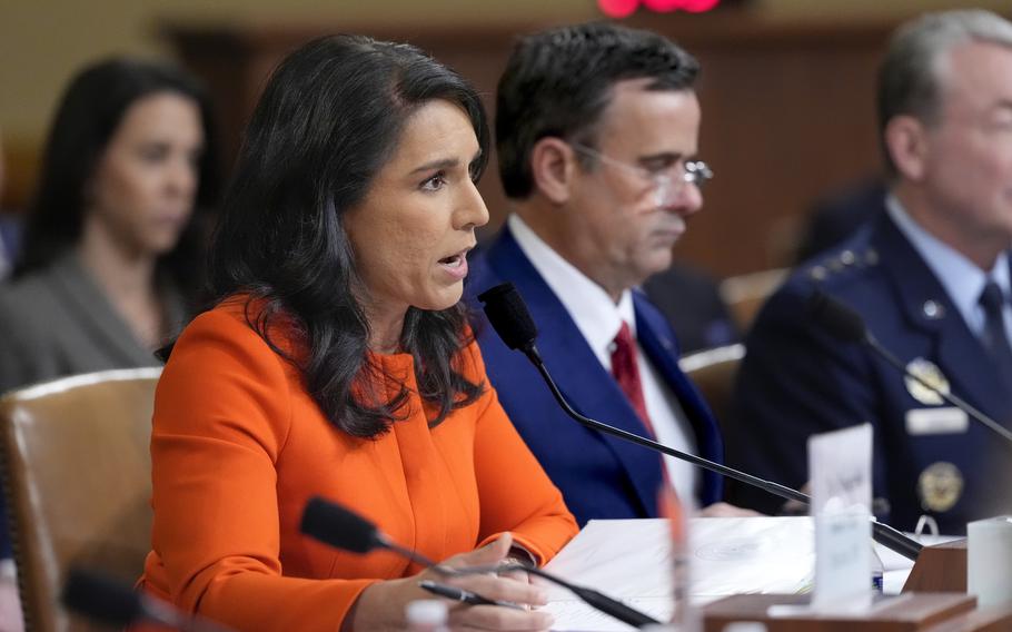 Gabbard and Ratcliffe at a hearing.