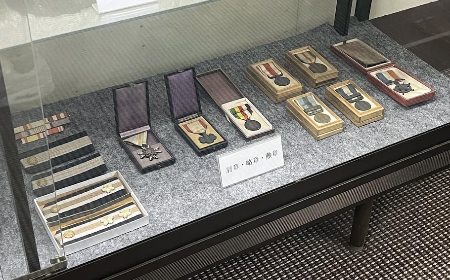 Medals, ribbons and shoulder boards worn by sailors of the HMJMS Misaka, which is now a floating museum in Yokosuka, Japan.