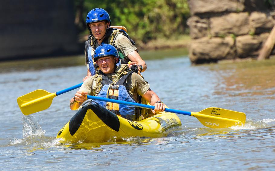Soldiers competing in the Army’s Best Ranger Competition kayak on the Chattahoochee River near downtown Columbus, Ga., on Saturday, April 15, 2023. 