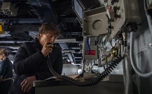 230303-N-MW880-1013 ADRIATIC SEA (March 3, 2023) Tom Cruise addresses the crew on the 1MC during a visit to the Nimitz-class aircraft carrier USS George H.W. Bush (CVN 77), March 3, 2023. The George H.W. Bush Carrier Strike Group is on a scheduled deployment in the U.S. Naval Forces Europe area of operations, employed by U.S. Sixth Fleet to defend U.S., allied and partner interests. (U.S. Navy photo by Mass Communication Specialist 3rd Class Samuel Wagner)