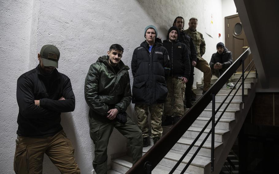 Foreign fighters who came to Ukraine to join a new international legion set up to fight Russian forces, seen in Kyiv on March 13, 2022. From left to right: Kelso from Montana; Mehmet from Germany; Adam from a Los Angeles suburb; Driven from Washington state; Nile and Mike from Sweden. 