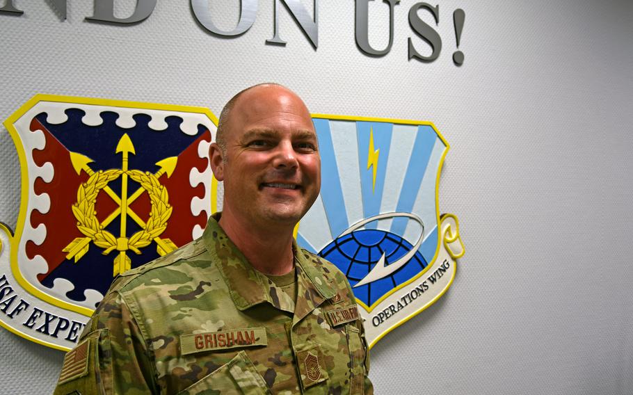Chief Master Sgt. Jeremiah Grisham,  the command chief of the 521st Air Mobility Operations Wing at Ramstein Air Base, Germany, on June 14, 2022. Grisham hopes his experience of serving in the Air Force for more than 20 years as a gay airman can reassure and inspire other LGBTQ military personnel.
