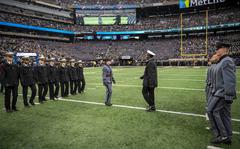 Midshipmen and cadets participate in the long-standing tradition, the “Prisoner Exchange,” in which cadets and midshipmen who have spent the previous semester at the opposite academy meet at midfield and “returned” to their respective academies during the Army-Navy football game held at the MetLife Stadium, East Rutherford, N.J., on Dec. 11, 2021. The game marked the 122nd meeting between the U.S. Naval Academy Midshipmen and the U.S. Army Black Knights. 