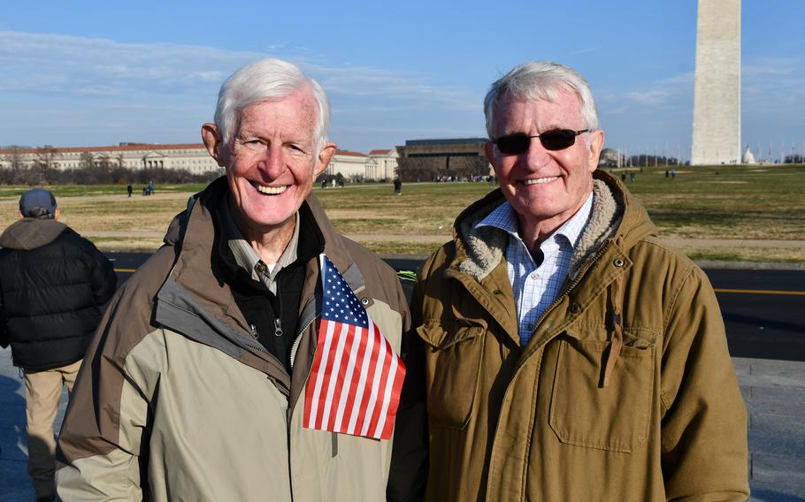 Paul Robbins, left, and Clay Wirt, right, attend the public remembrance of Sen. Bob Dole at the National World War II Memorial on Friday, Dec. 10, 2021. Wirt worked on Dole’s congressional staff from 1970 to 1974. 