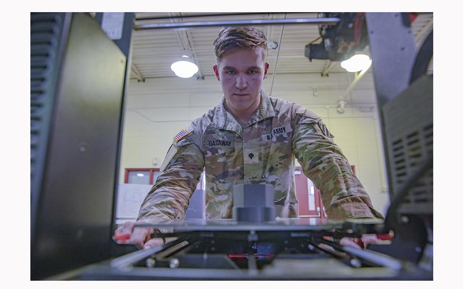 Army Spc. Spencer Gasaway builds a custom hub cap mount at Marne Innovation Center on Fort Stewart, Ga., Apr. 20, 2023. 