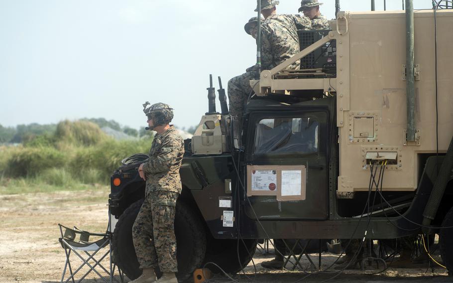 U.S. Marines participate in a live-fire drill featuring a High Mobility Artillery Rocket System, or HIMARS, during Balikatan at Naval Station Leovigildo Gantioqui in San Antonio, Philippines, Wednesday, April 26, 2023.