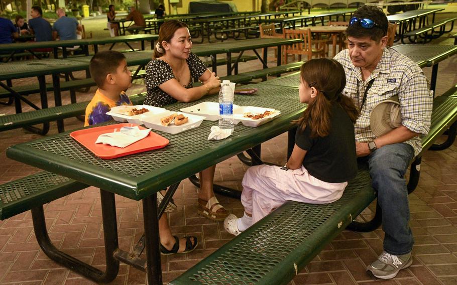 The Taylor family attends a Morale, Welfare and Recreation event at Naval Support Activity Bahrain, Nov. 16, 2023. Attendance at events on base have increased because of restrictions on troops and family members going off base, which followed the outset of the Israel-Hamas war.