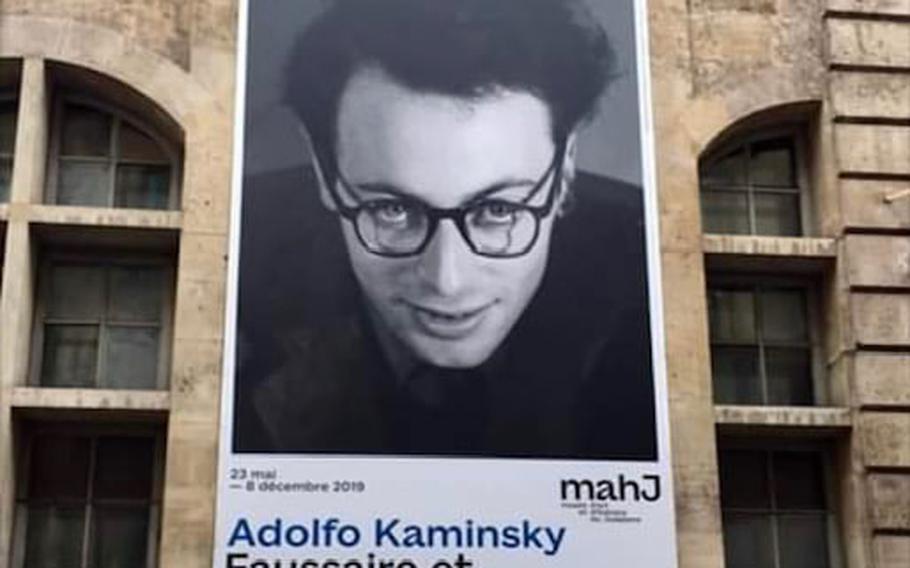 A poster advertises an exhibit of Adolfo Kaminsky’s work on June 5, 2020. Kaminsky was a self-taught master of forgery and lent his skills over the years to Algerians during their struggle for independence from France, to opponents of the fascist dictator Francisco Franco of Spain, to revolutionaries in Latin America, to anti-apartheid activists in South Africa and to American deserters during the Vietnam War.