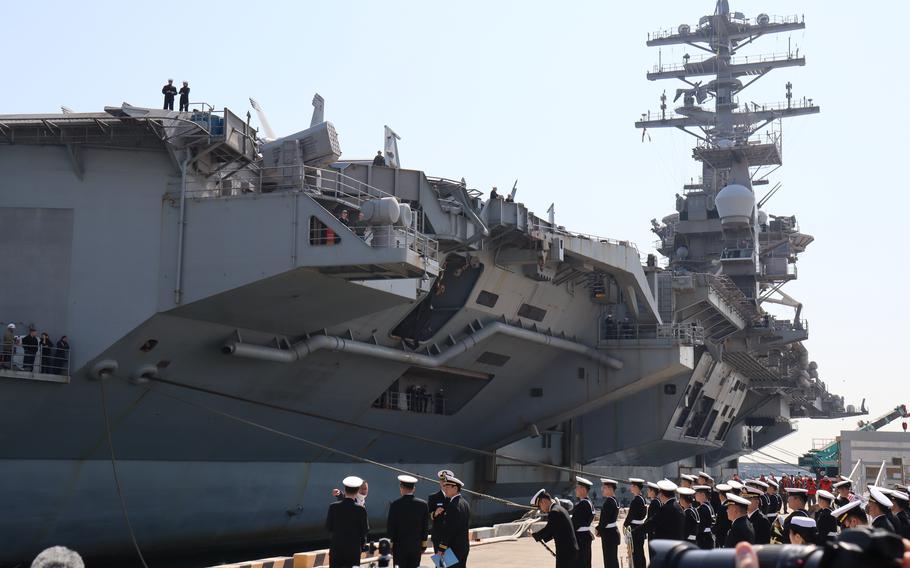 The aircraft carrier USS Nimitz arrives to a welcome ceremony at Busan, South Korea, March 28, 2023. 