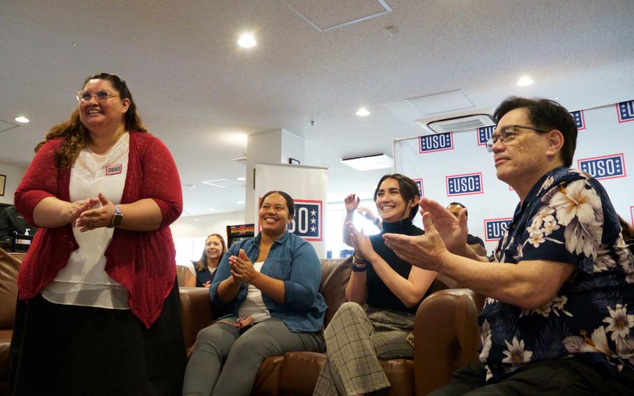 Service members and veterans take part in a virtual meetup with the stars of “The Covenant,” Jake Gyllenhaal and Dar Salim, at the USO on Yokosuka Naval Base, Japan, Friday, April 21, 2023.