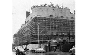 Hed: Ernie Pyle Theater gets a face lift, 1955

Tokyo, Japan, Feb. 2, 1955: Scaffolding surrounds the building formerly known as The Ernie Pyle Theater. The largest military theater closed its doors Jan. 2, 1955 after a 9-year run showcasing both movie and theater productions. Once the most modern building in the nation, "The Pyle" was used as a balloon factory during World War II, before the U.S. took it over and turned it into a theater. The building was returned to the Japanese government and is currently undergoing renovations before its scheduled reopening Apr. 1, 1955 under its original 1934 name Takarazuka Gekijo (Takarazuka Theater).

Looking for Stars and Stripes’ historic coverage? Subscribe to Stars and Stripes’ historic newspaper archive! We have digitized our 1948-1999 European and Pacific editions, as well as several of our WWII editions and made them available online through https://starsandstripes.newspaperarchive.com/

META TAGS: Pacific; Japan; entertainment; movies; theater; The Ernie Pyle Theater; post-occupation era