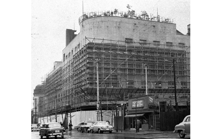 Scaffolding surrounds a building.