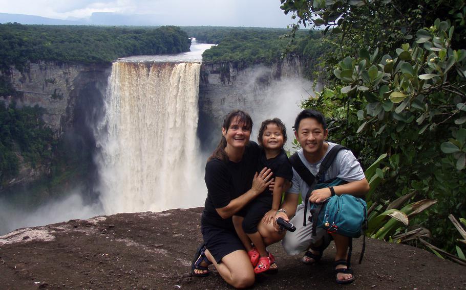 Tracy, Cathy and Eric Rice visit a waterfall during a trip to Guyana in 2008.