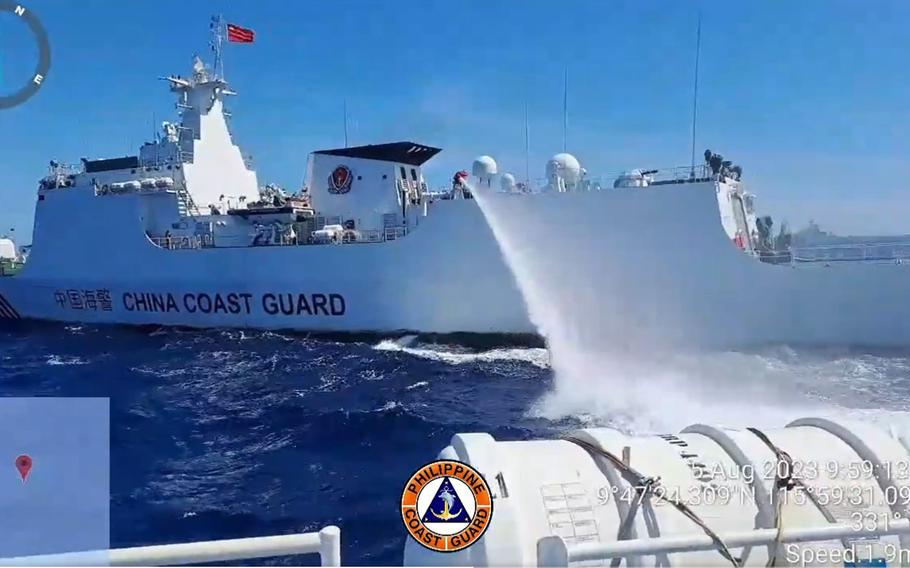 A screenshot from a video posted Aug. 6, 2023, on Twitter by the Philippine Coast Guard purports to show a China coast guard vessel using a high-pressure hose to harass a Philippine vessel in the South China Sea.