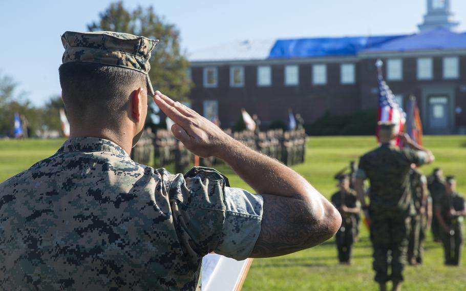Marine salute toward the flag