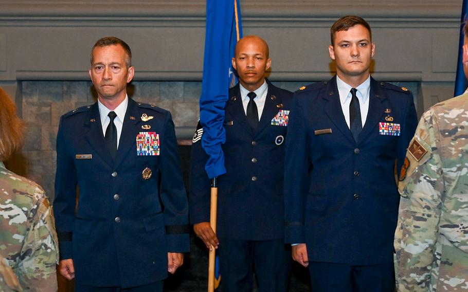 Air Force Maj. Nathaniel Roesler, right, assumes command of the Warrant Officer Training School at Maxwell Air Force Base in Alabama.