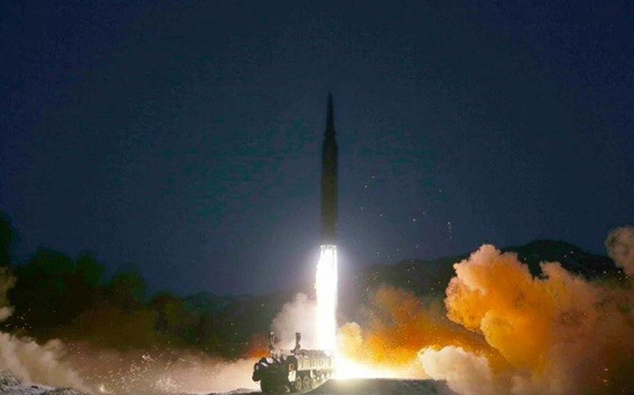 A North Korean missile takes flgiht in this image released Wednesday, Jan. 12, 2022, by the state-run Korean Central News Agency.