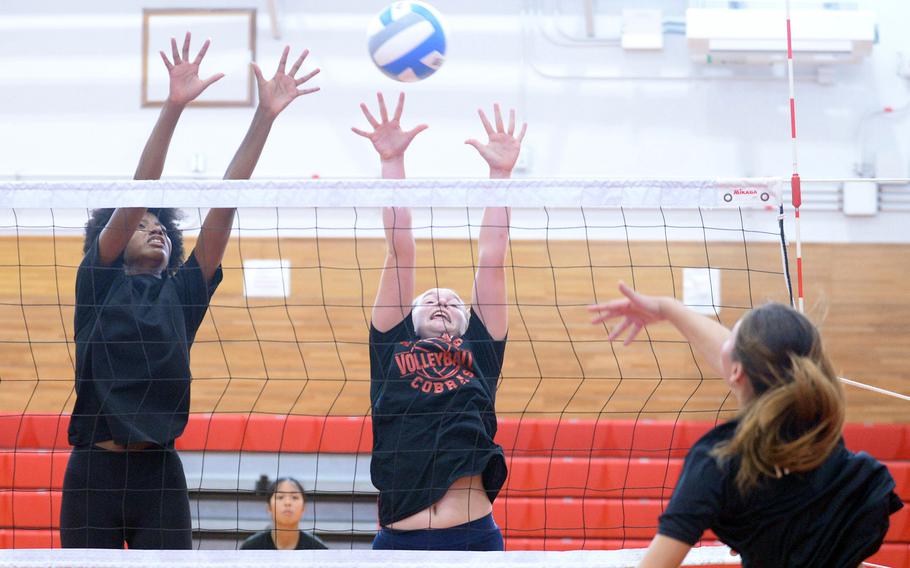 They played on opposite sides of the net last year, Liz Johnson for Robert D. Edgren, Madylyn O'Neill for E.J. King. Now, the sophomores are playing on the same side as members of the Cobras.