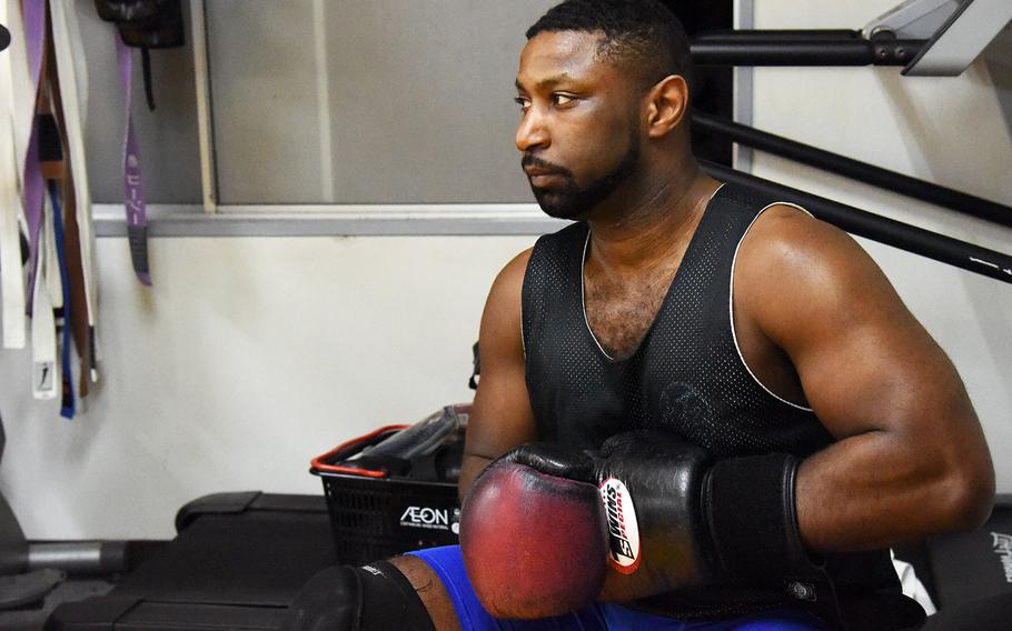 Air Force Staff Sgt. Charles Prete, a defense courier and MMA fighter stationed at Yokota Air Base, Japan, prepares to train at Alpha Reversal Gym in Tachikawa, April 12, 2023. 