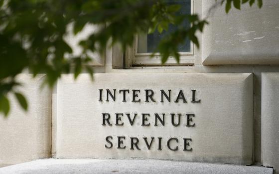 FILE - A sign outside the Internal Revenue Service building is seen on May 4, 2021, in Washington. A former contractor for the Internal Revenue Service has been charged with leaking tax information to news outlets about a government official and thousands of the country’s wealthiest people. The Justice Department said in a statement Friday, Sept. 29, 2023, that 38-year-old Charles Edward Littlejohn of Washington, D.C. is accused of stealing tax return information and giving it to two different news outlets between 2018 and 2020. (AP Photo/Patrick Semansky, File)