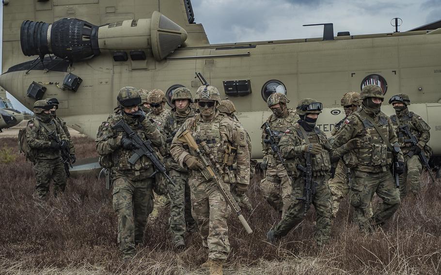 Soldiers with the 82nd Airborne Division train with Polish soldiers from the 18th Mechanized Division in southeastern Poland in late February. 