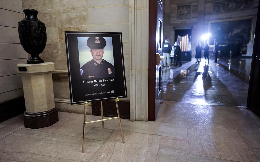 A sign just outside the U.S. Capitol Rotunda in Washington, D.C., on Feb. 2, 2021, honoring Capitol Police Officer Brian D. Sicknick, 42, who died a day after he was assaulted in the Jan. 6 insurrection. Sicknick received the distinction of lying in honor in the Rotunda.