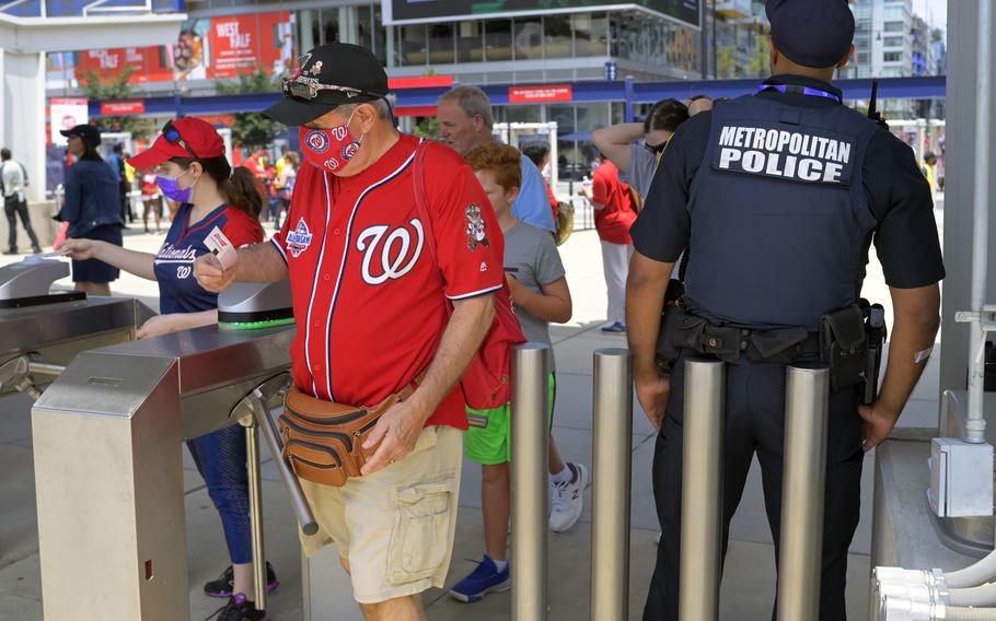 Fans return to Nationals Park on July 18, 2021, hours after a Saturday night shooting outside the ballpark.