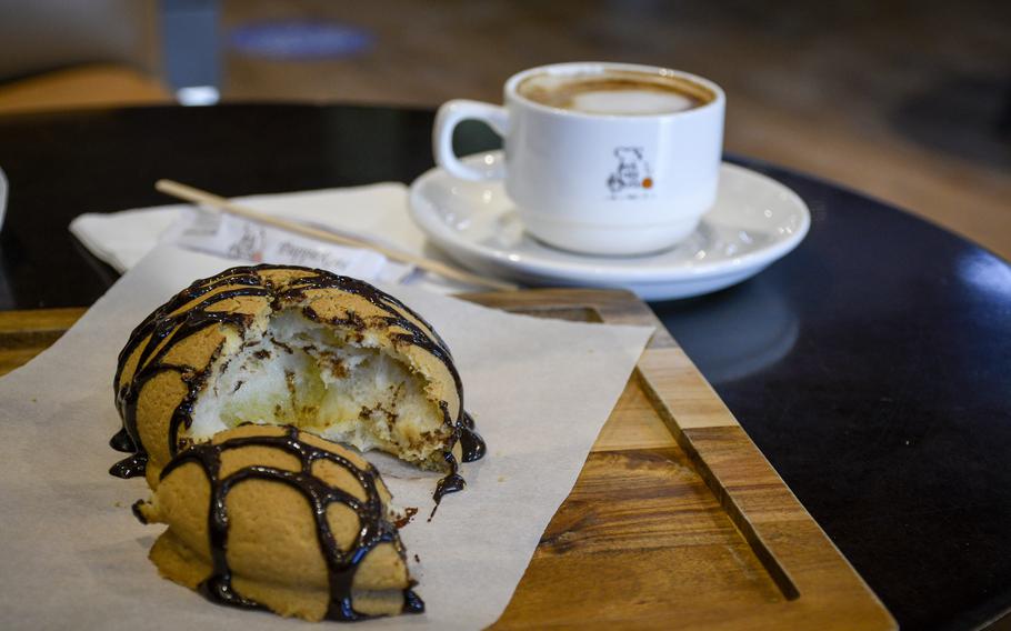 Pappa Roti, a bakery in Doha, Qatar, about a 40-minute drive from Al Udeid Air Base, offers sweet buns filled with sugar and coated in a baked-in crust of coffee caramel.
