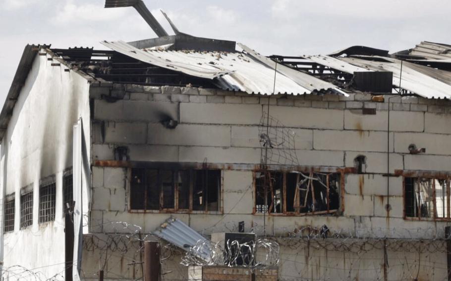 A video screen grab shows a view of a destroyed barracks at a prison in Olenivka, in an area controlled by Russian-backed separatist forces, eastern Ukraine, Friday, July 29, 2022.
