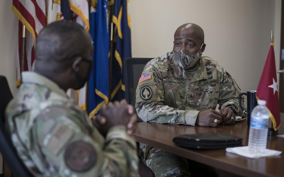 U.S. Army Brig. Gen. Kodjo Knox-Limbacker, right, adjutant general, Virgin Islands National Guard (VING), speaks with U.S. Air Force Chief Master Sgt. Maurice L. Williams, command chief, Air National Guard, during a visit to the VING Joint Force Headquarters in Kingshill, St. Croix, April 11, 2021. Knox-Limbacker recently was promoted the rank of major general.